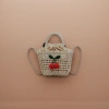 Beige woven bag with cherry decoration, hand-held shoulder bag Application Scenario